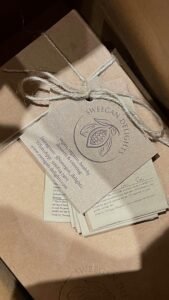 Sustainable packaging featuring organic branding and twine.